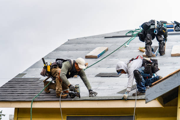 Professional Gutter Installation technician working in Mather, CA